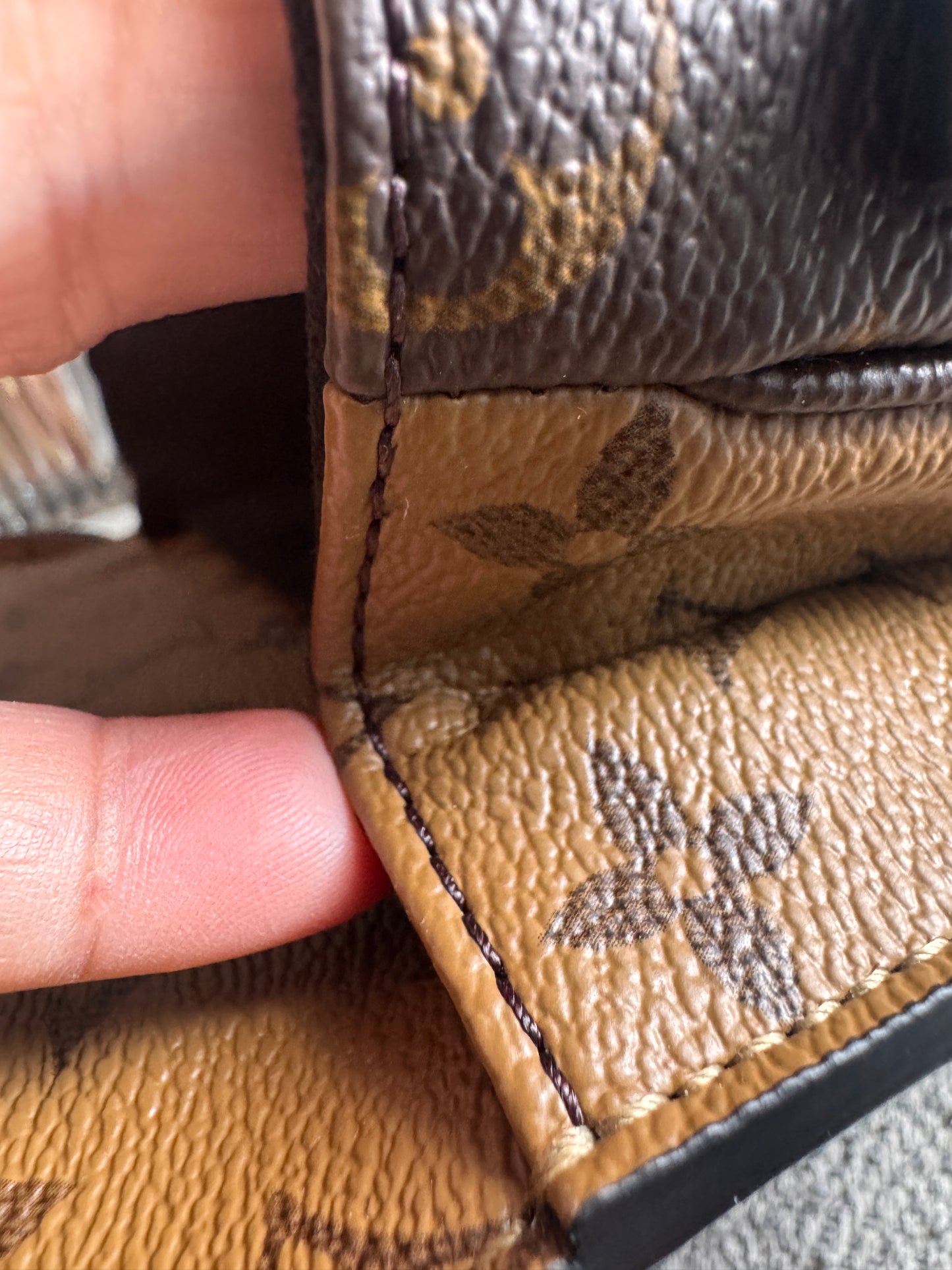 Louis Vuitton Pochette Metis in Reverse Monogram