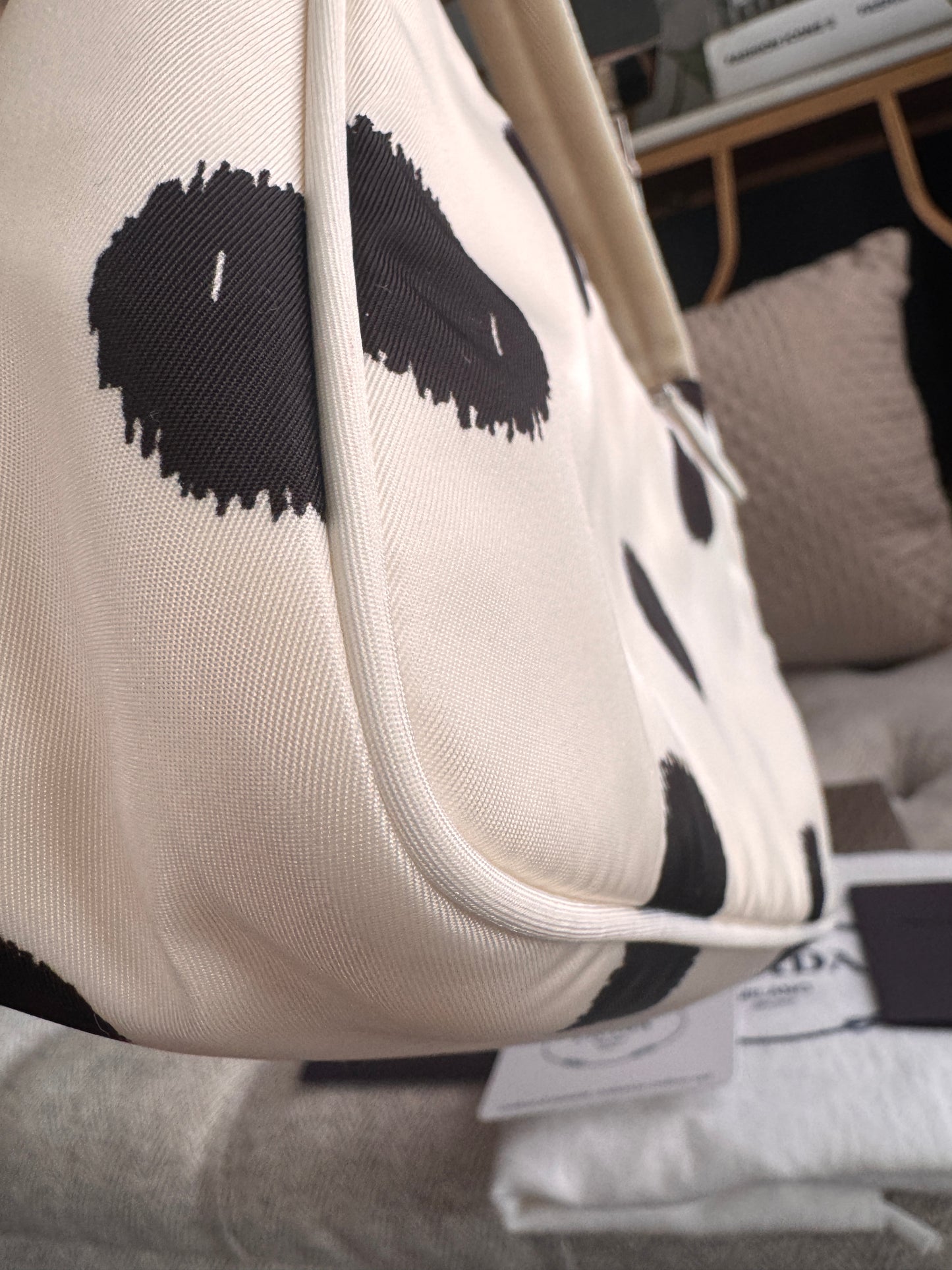 PRADA
Tessuto Nylon Polka-Dot Mini Re-Edition 2000 Bag White Black
