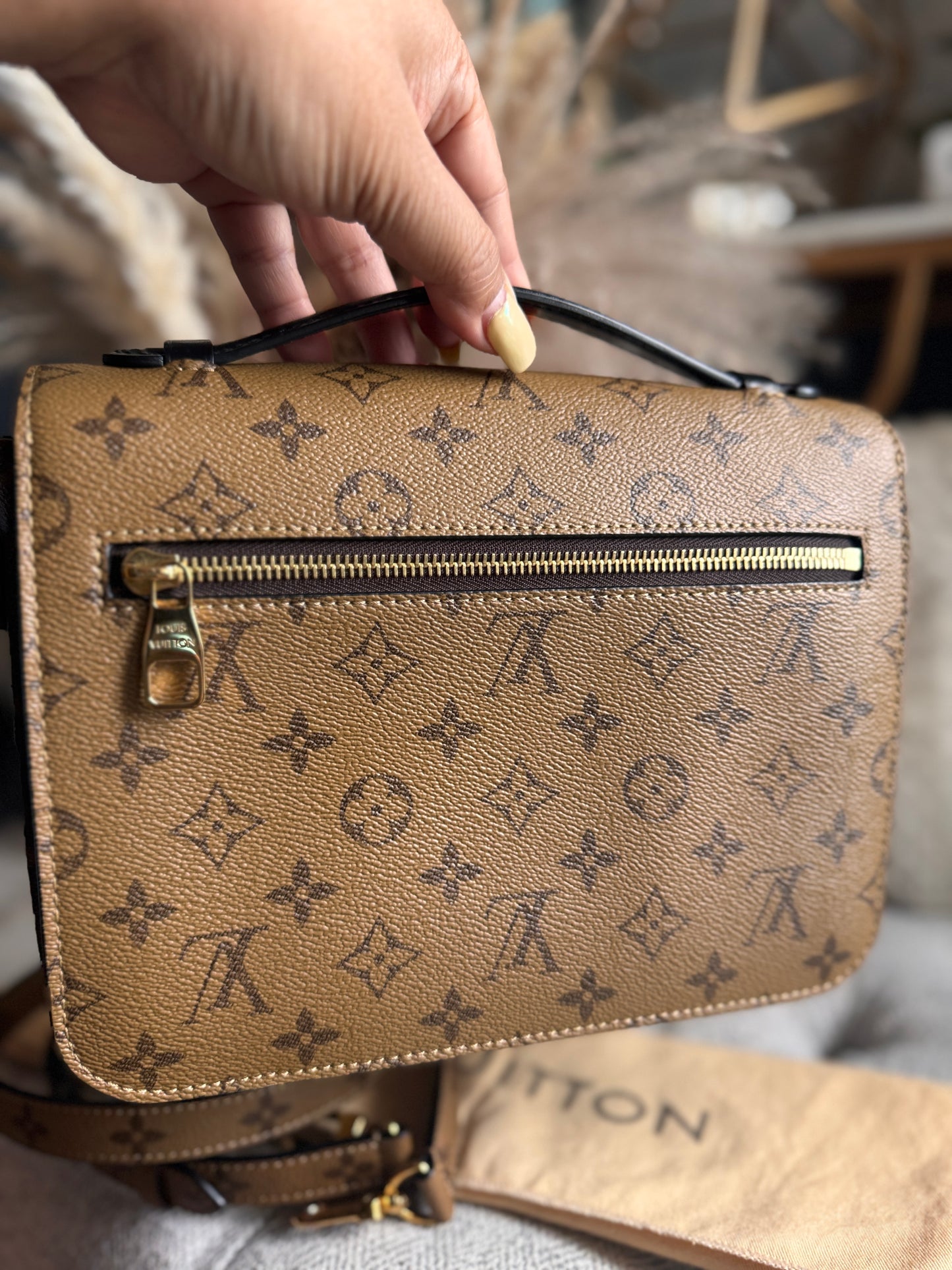 Louis Vuitton Pochette Metis in Reverse Monogram