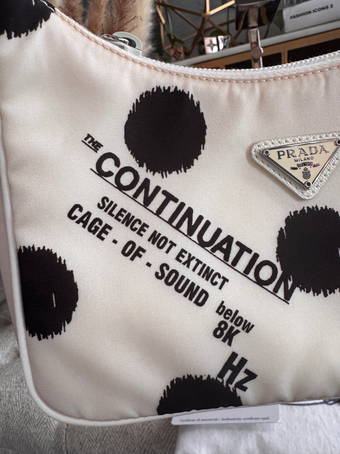 PRADA
Tessuto Nylon Polka-Dot Mini Re-Edition 2000 Bag White Black