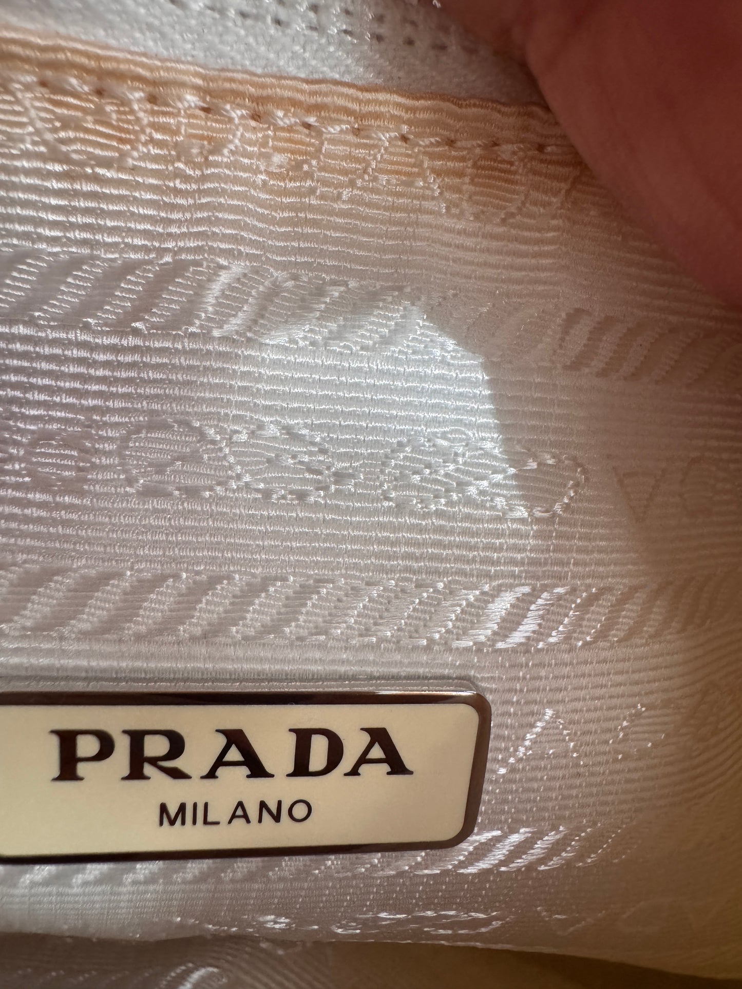 PRADA
Tessuto Nylon Polka-Dot Mini Re-Edition 2000 Bag White Black