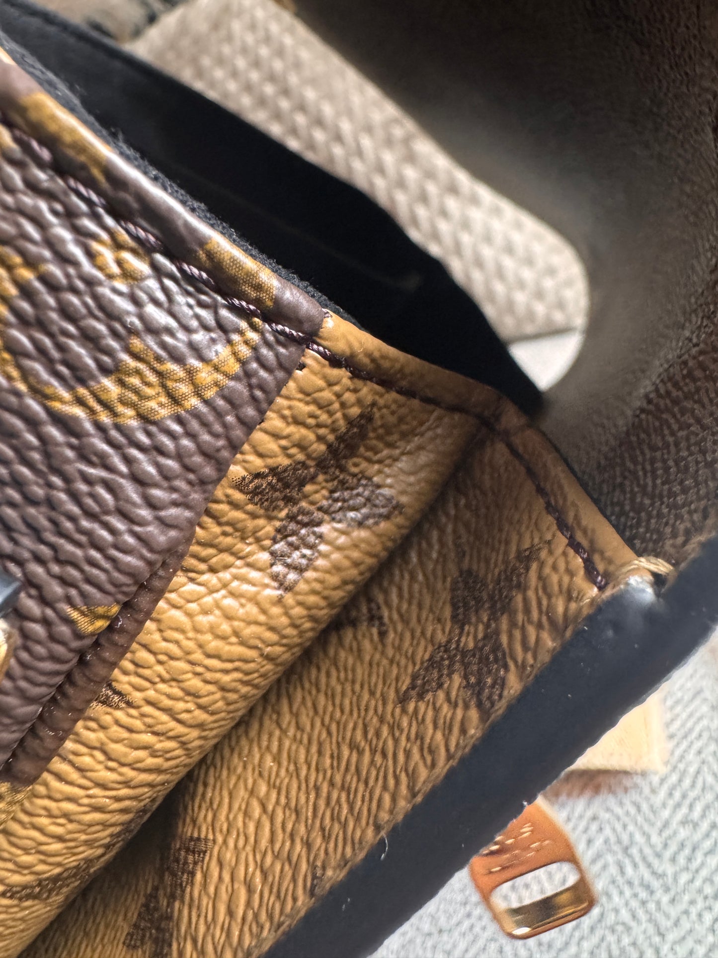 Louis Vuitton Pochette Metis in Reverse Monogram