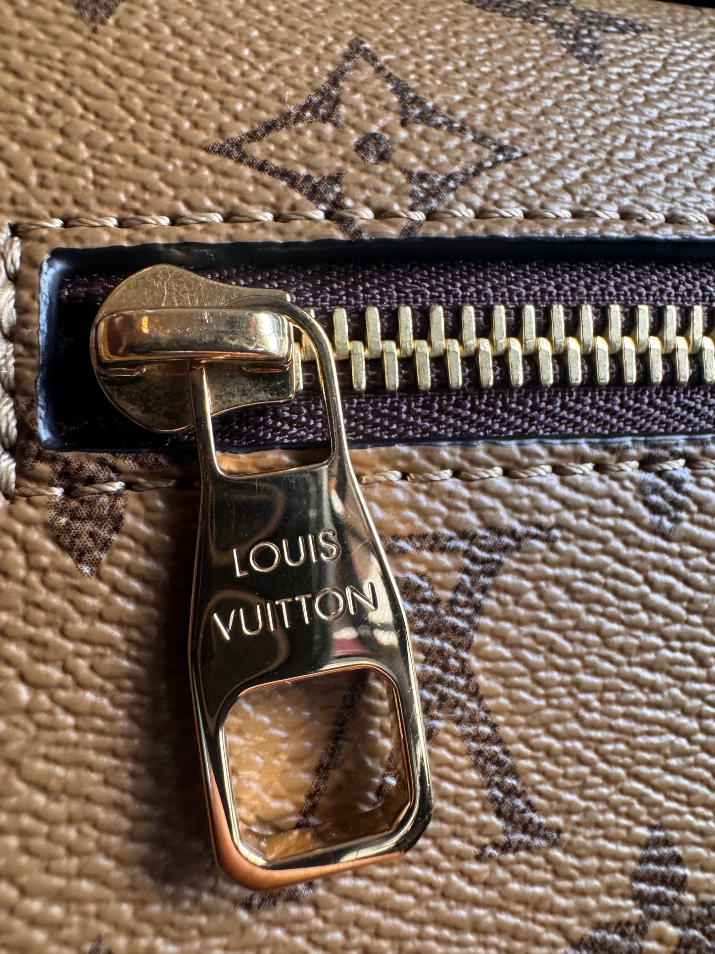 Louis Vuitton Pochette Metis in Reverse Monogram