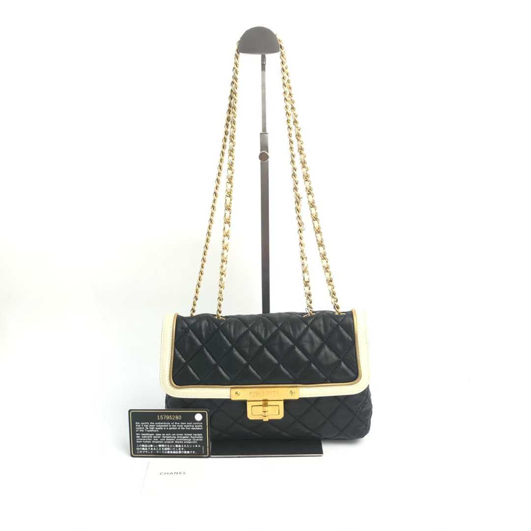 PREORDER ONLY- CHANEL Glazed Calfskin 2.55 East West Mademoiselle Flap in Black and White.