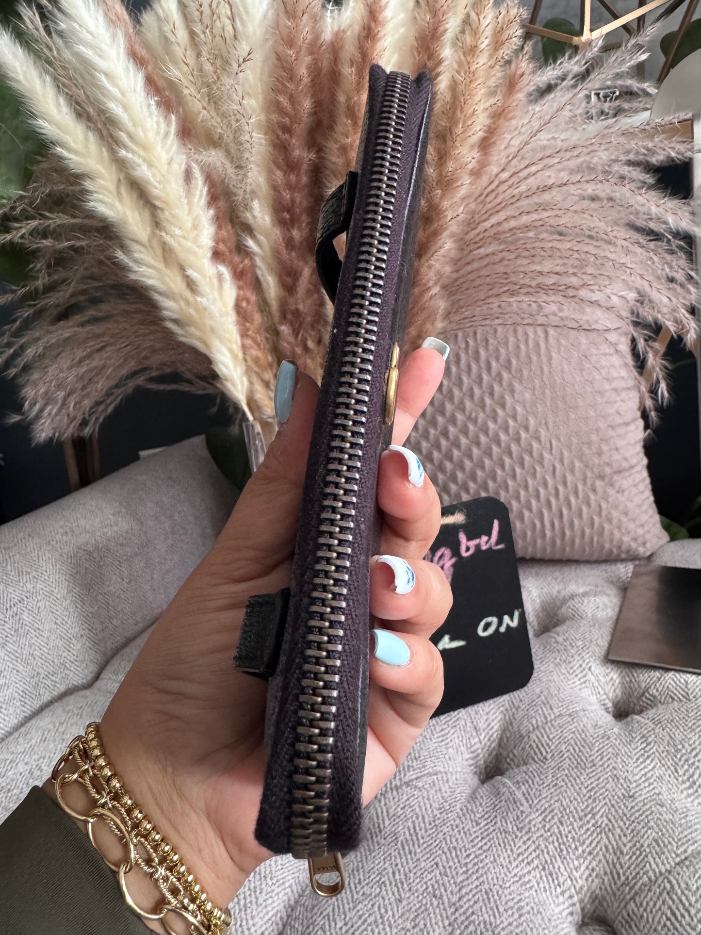 Gucci Black Fullsized Zippy Wallet with belt loops