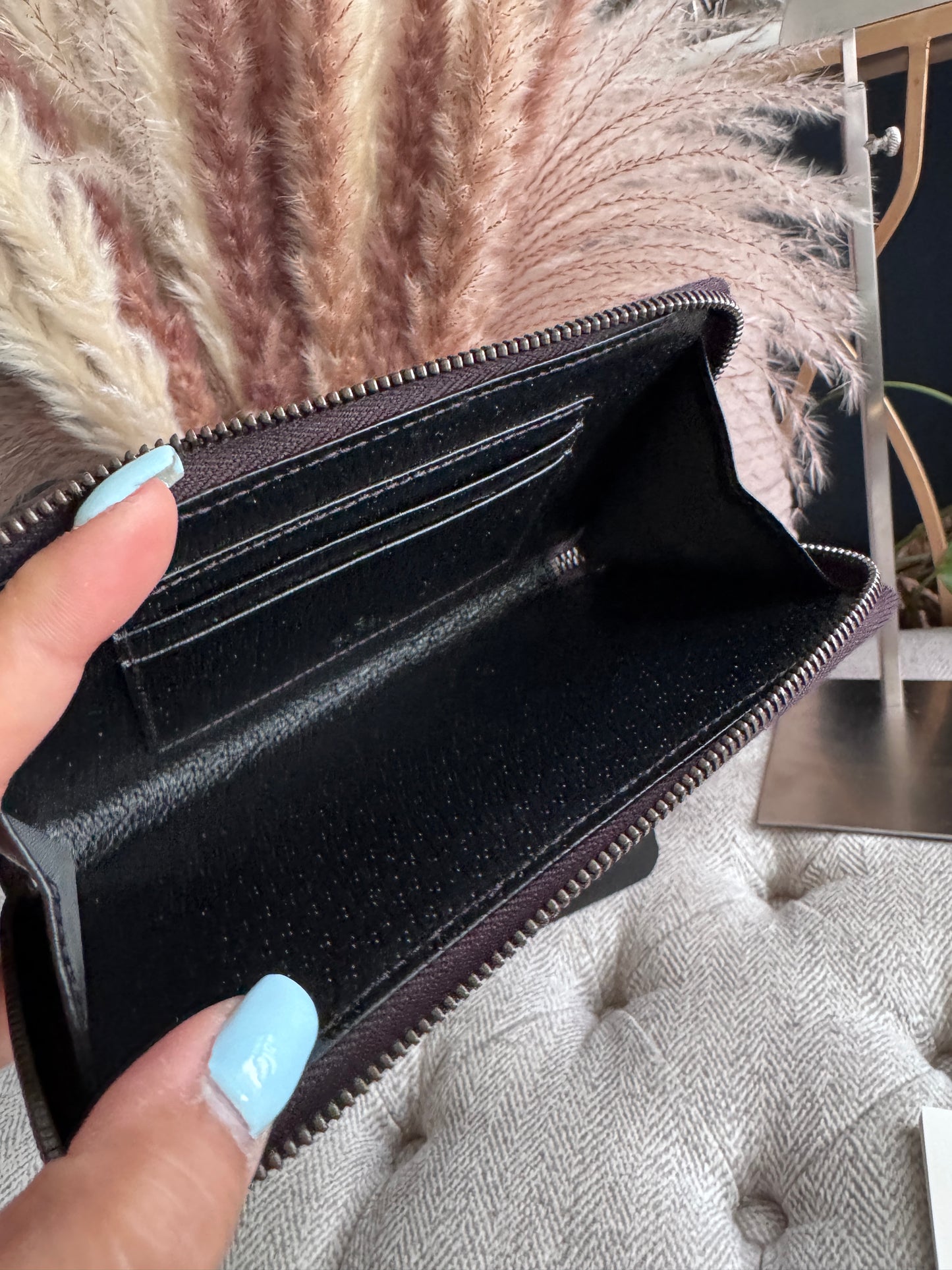 Gucci Black Fullsized Zippy Wallet with belt loops