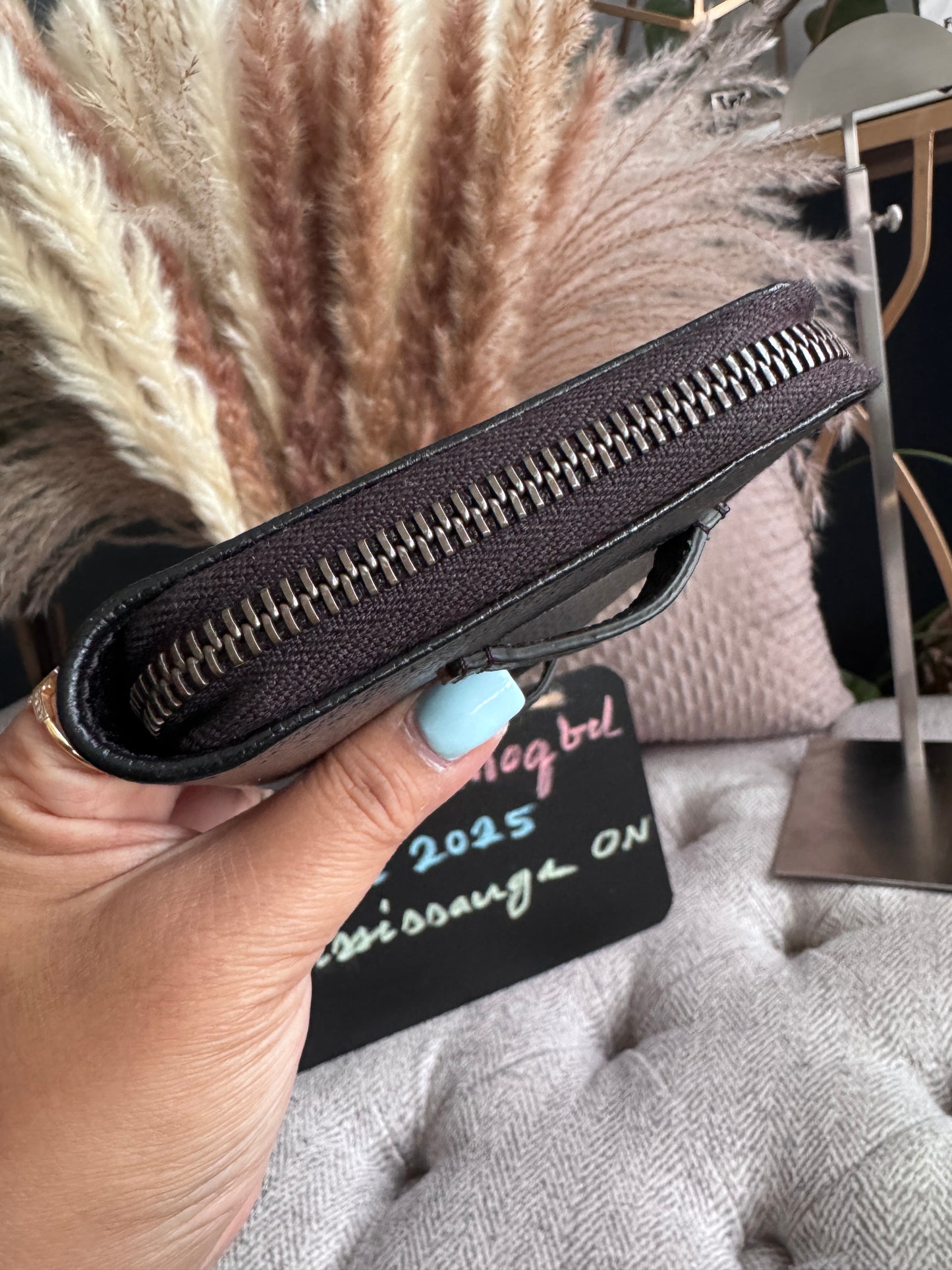 Gucci Black Fullsized Zippy Wallet with belt loops