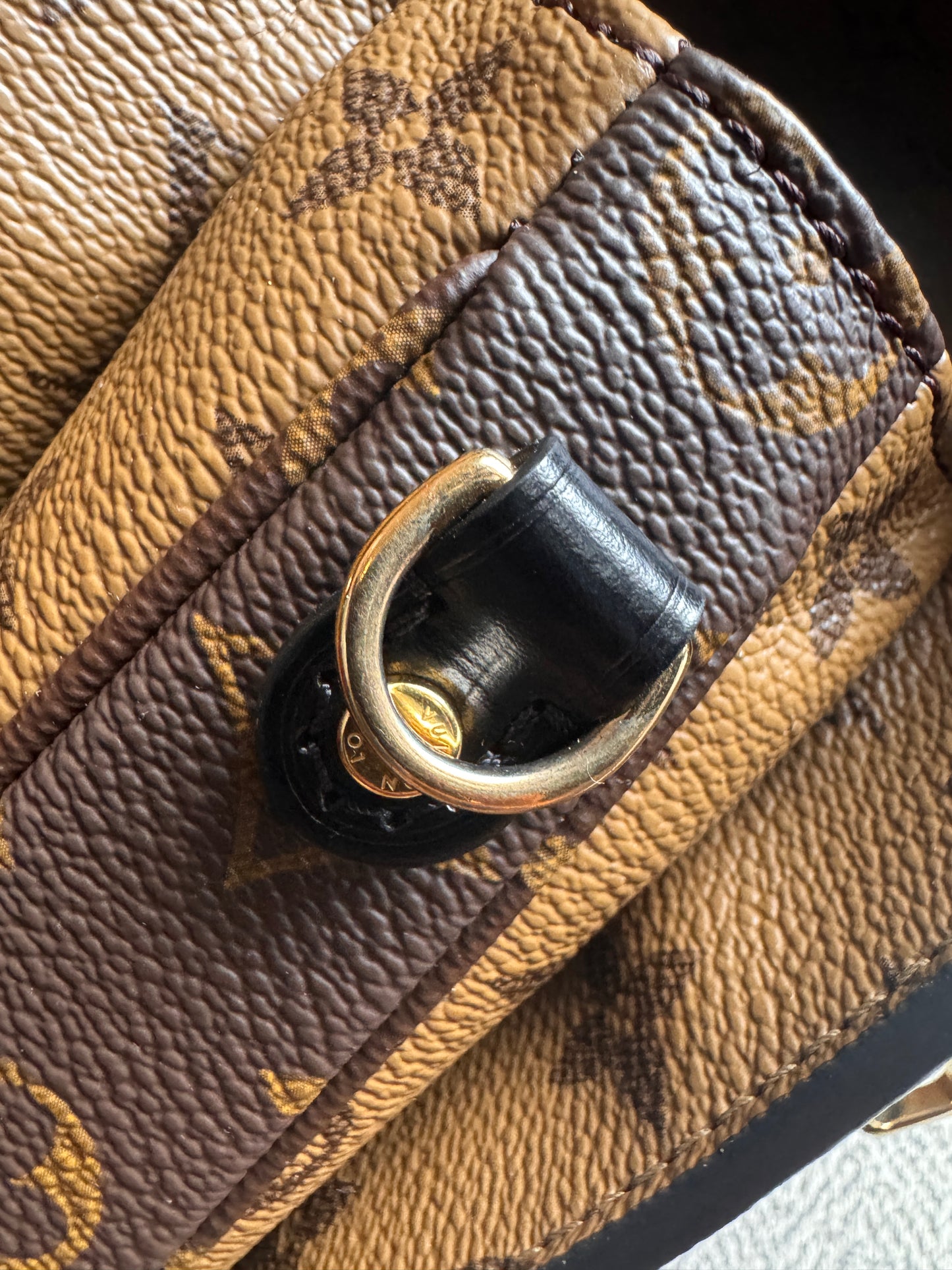 Louis Vuitton Pochette Metis in Reverse Monogram