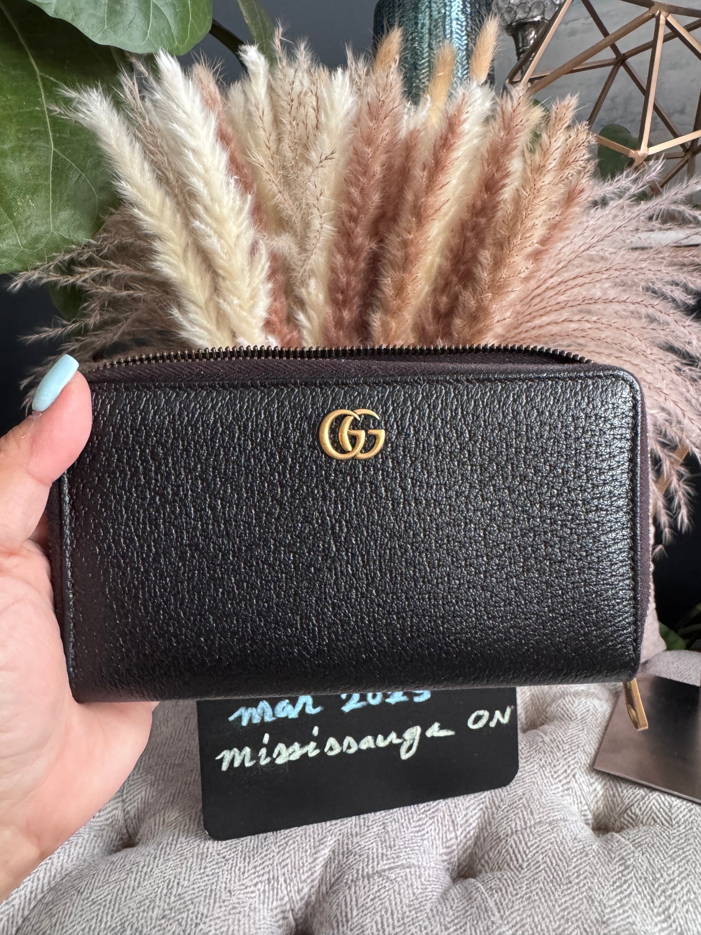 Gucci Black Fullsized Zippy Wallet with belt loops