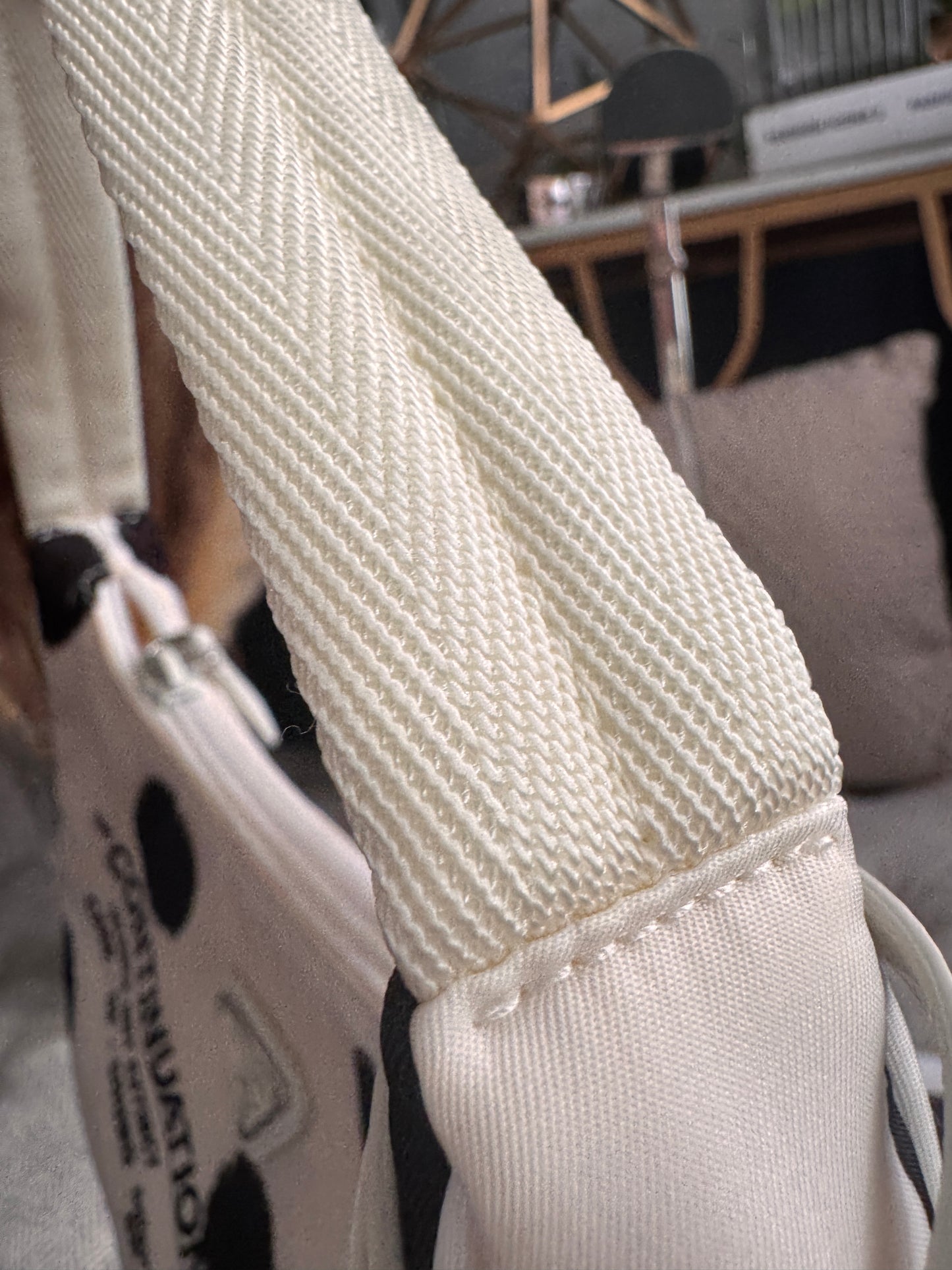 PRADA
Tessuto Nylon Polka-Dot Mini Re-Edition 2000 Bag White Black