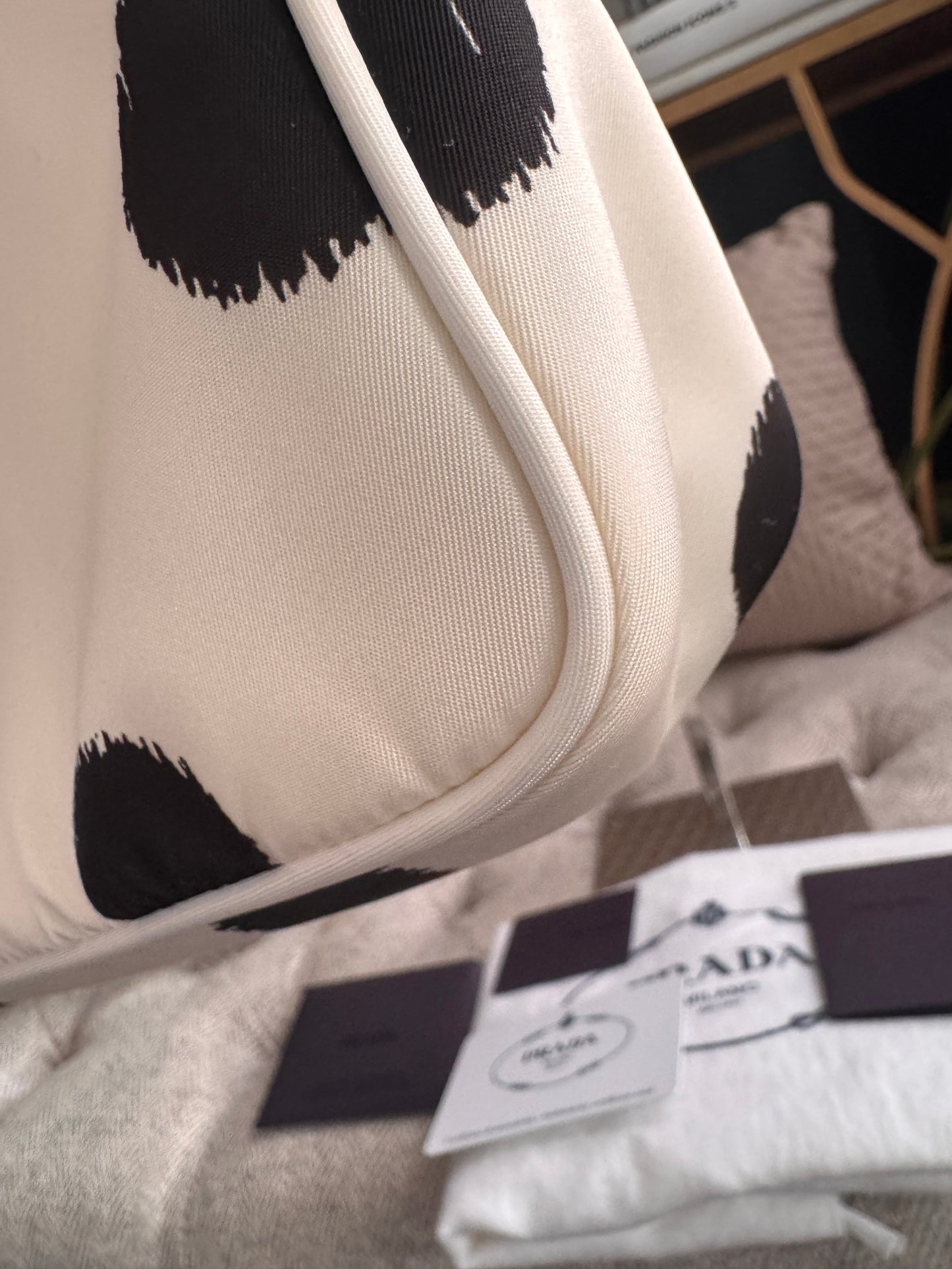 PRADA
Tessuto Nylon Polka-Dot Mini Re-Edition 2000 Bag White Black