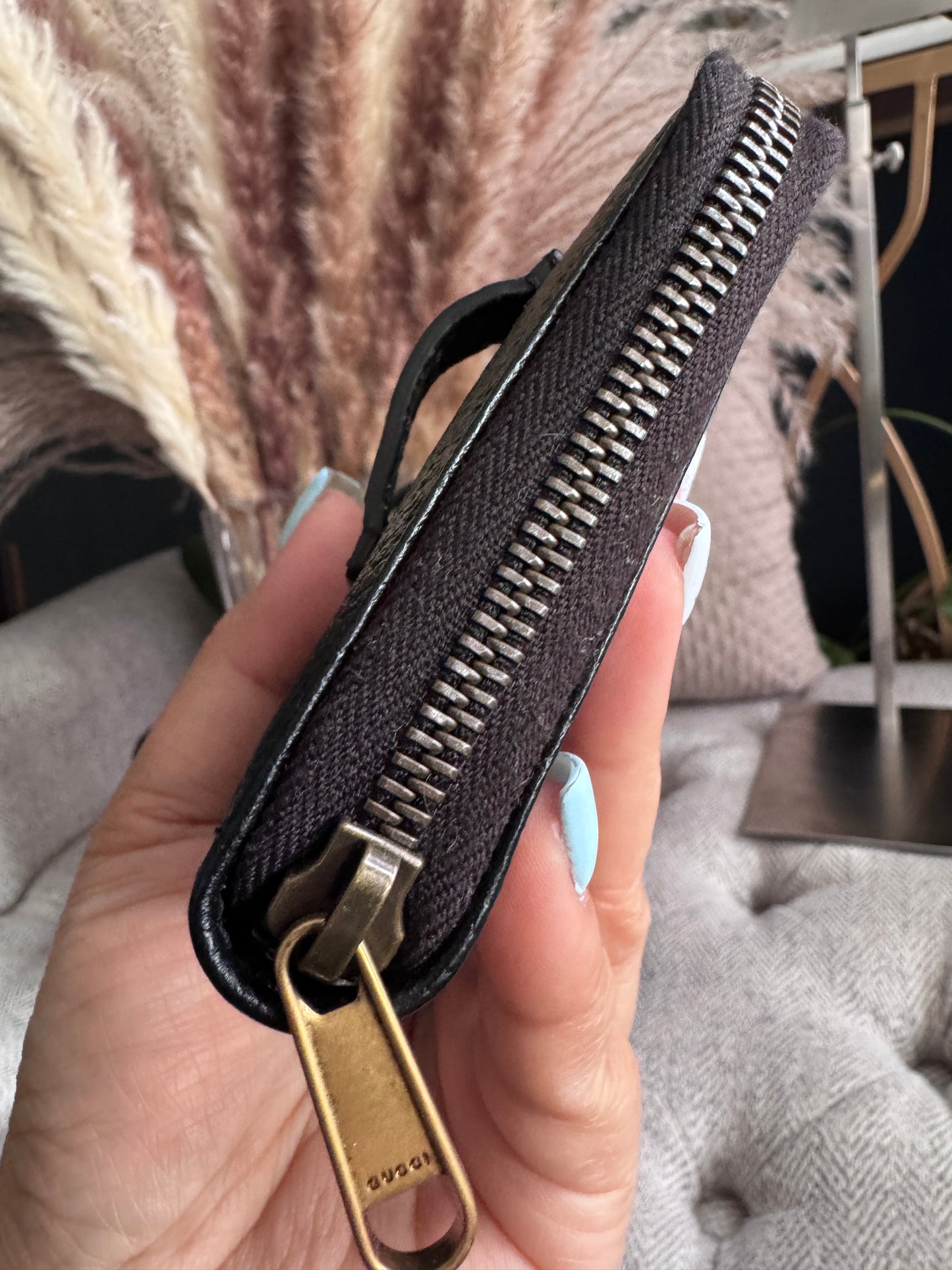 Gucci Black Fullsized Zippy Wallet with belt loops