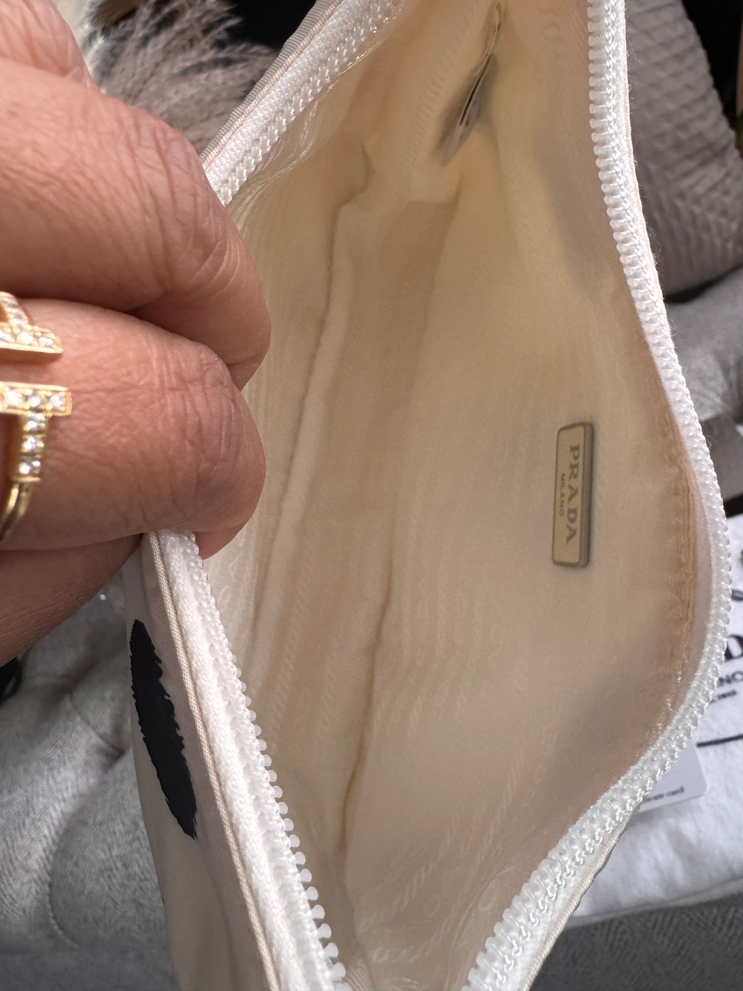PRADA
Tessuto Nylon Polka-Dot Mini Re-Edition 2000 Bag White Black
