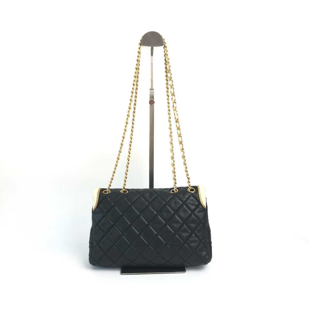 PREORDER ONLY- CHANEL Glazed Calfskin 2.55 East West Mademoiselle Flap in Black and White.