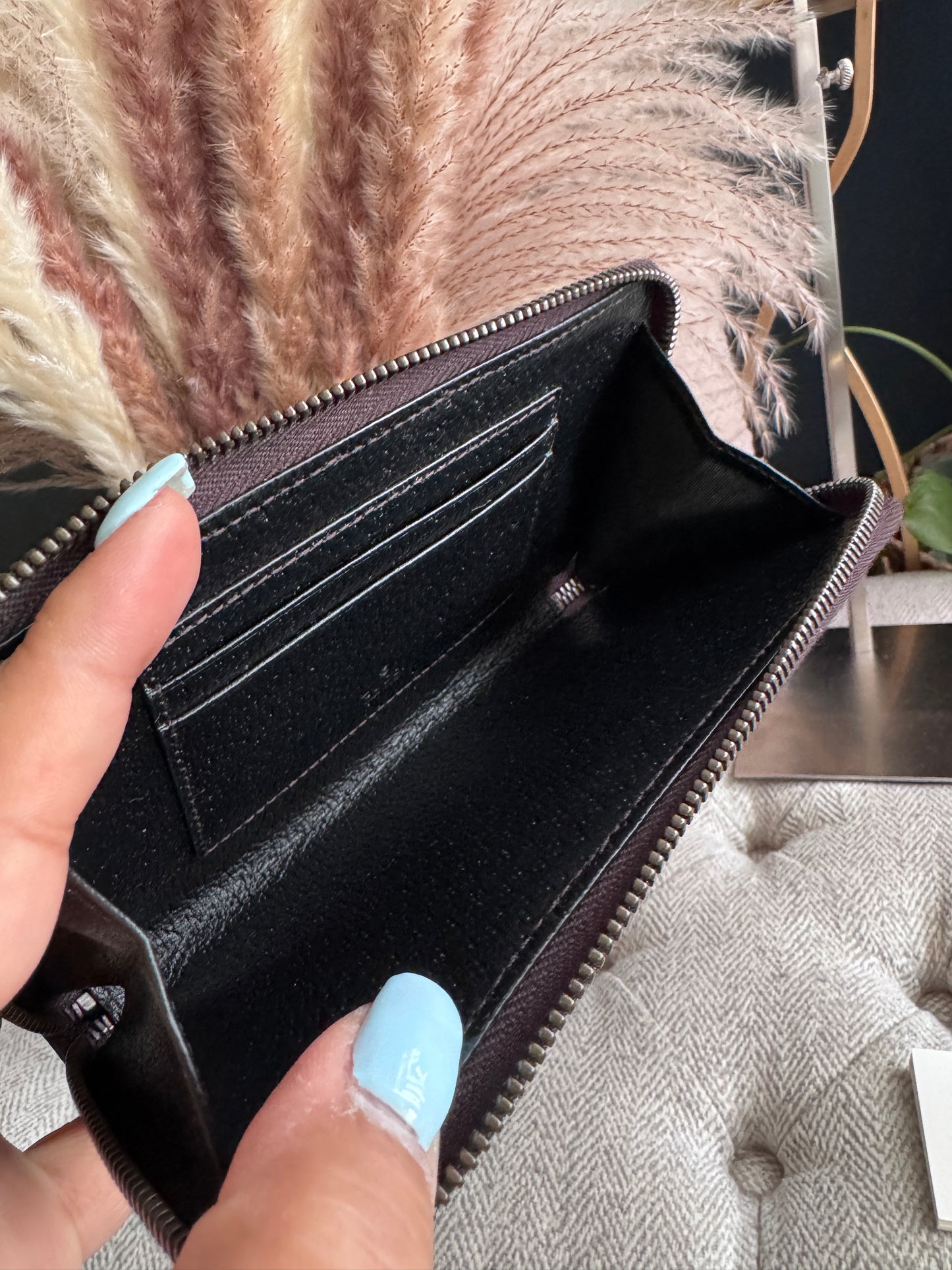 Gucci Black Fullsized Zippy Wallet with belt loops