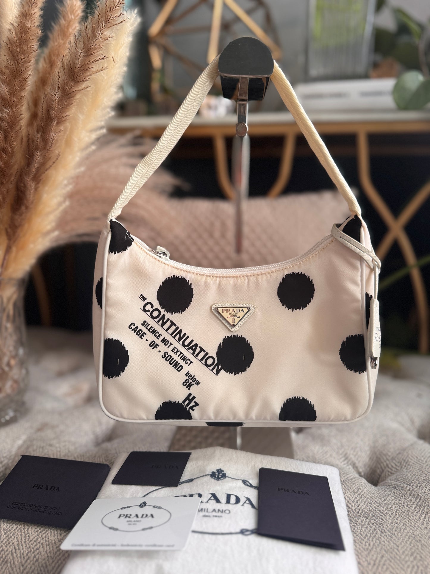 PRADA
Tessuto Nylon Polka-Dot Mini Re-Edition 2000 Bag White Black