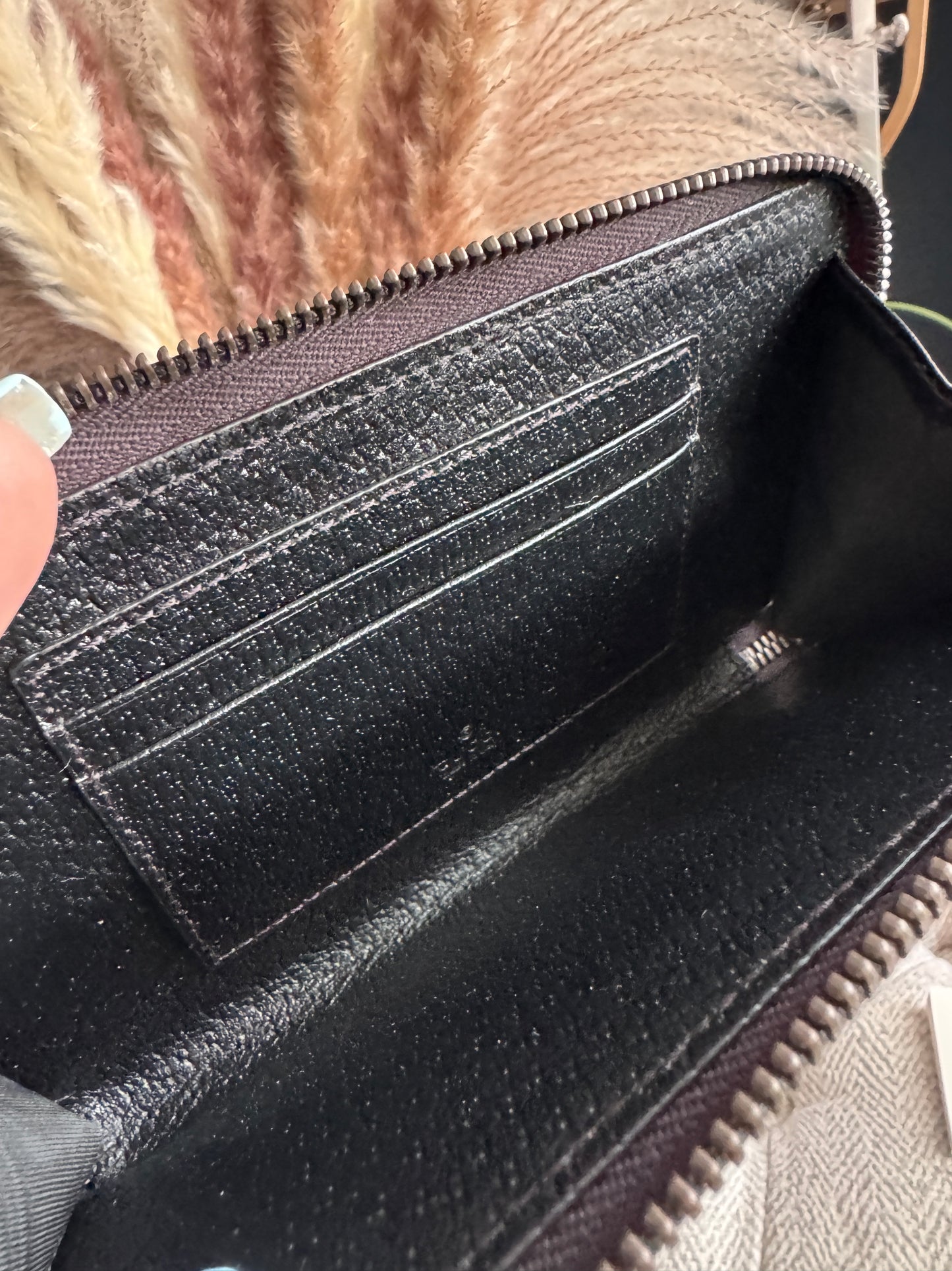Gucci Black Fullsized Zippy Wallet with belt loops