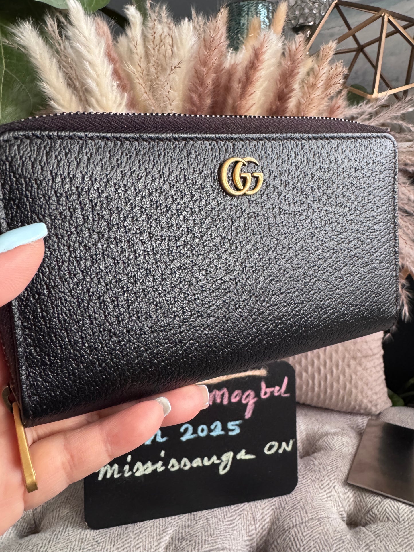 Gucci Black Fullsized Zippy Wallet with belt loops