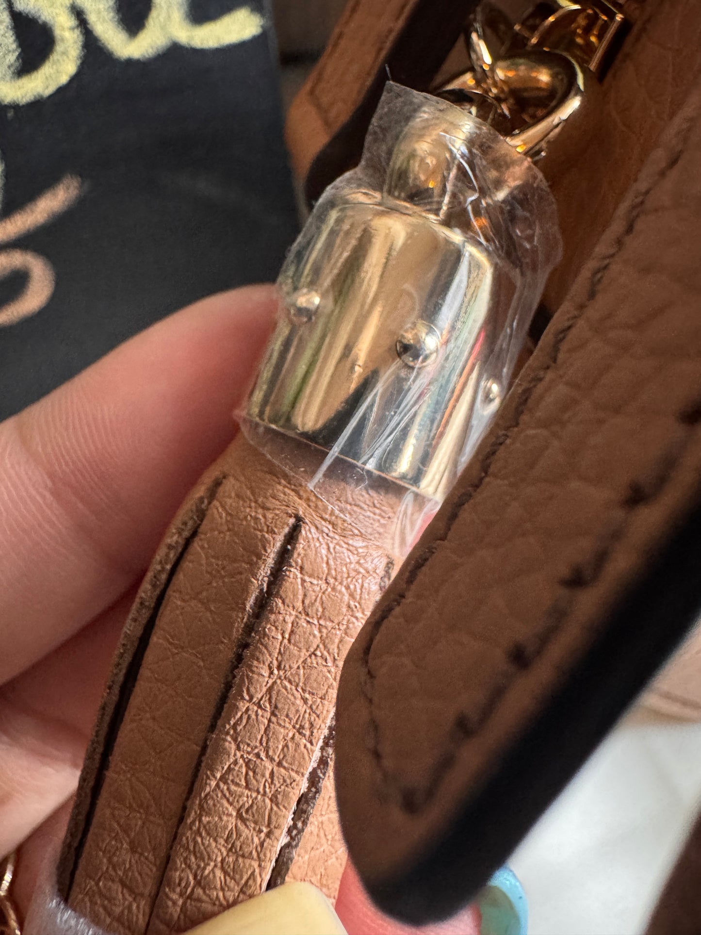 GUCCI 
Pebbled Calfskin Oval Soho Shoulder Bag Beige Camelia