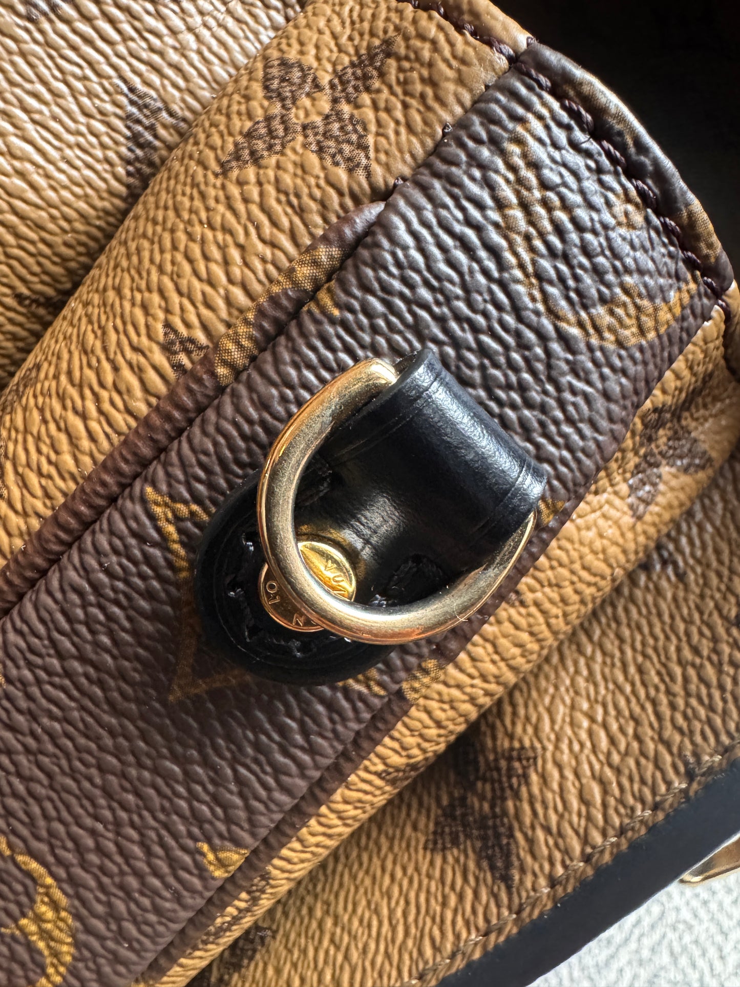 Louis Vuitton Pochette Metis in Reverse Monogram