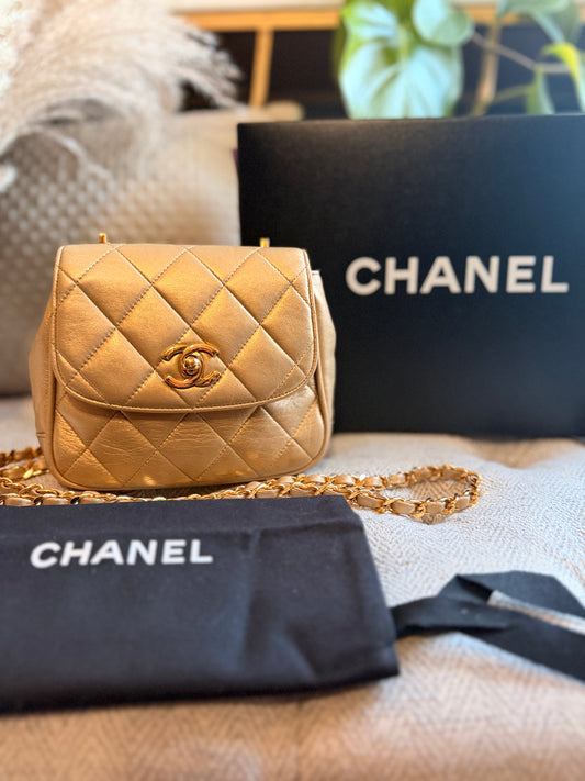 Chanel Metallic Lambskin Quilted Mini Flap in Gold