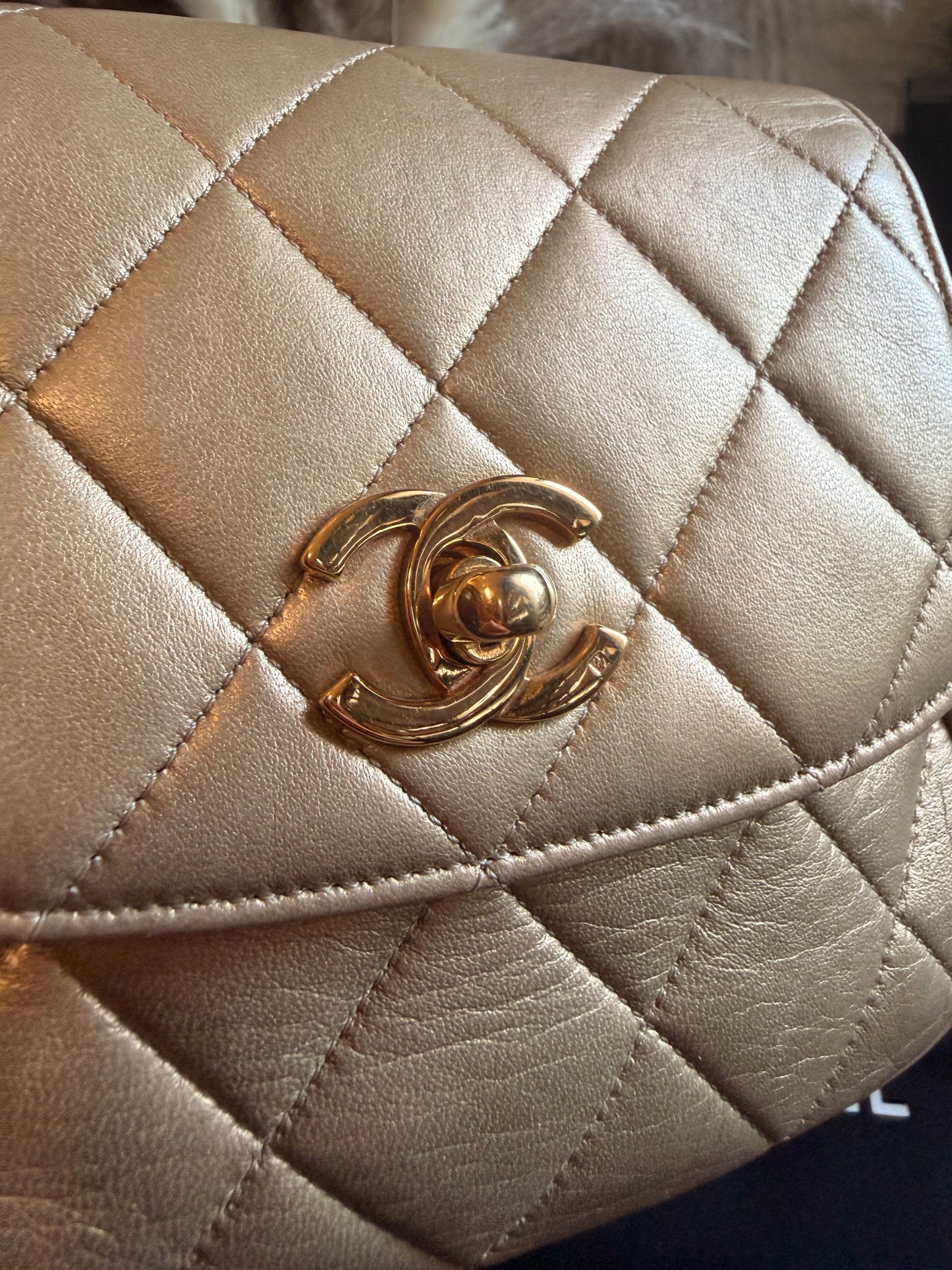 Chanel Metallic Lambskin Quilted Mini Flap in Gold