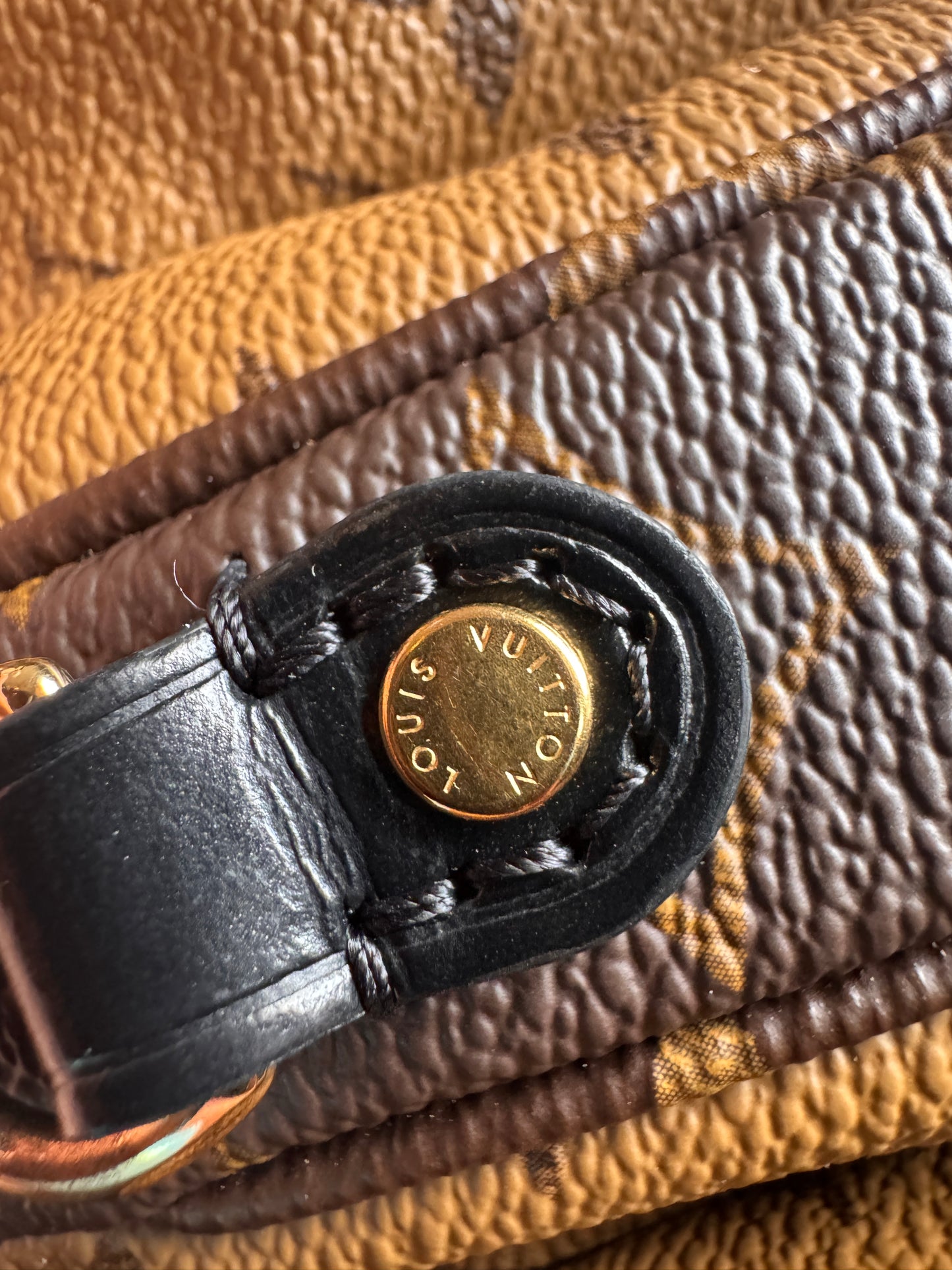 Louis Vuitton Pochette Metis in Reverse Monogram