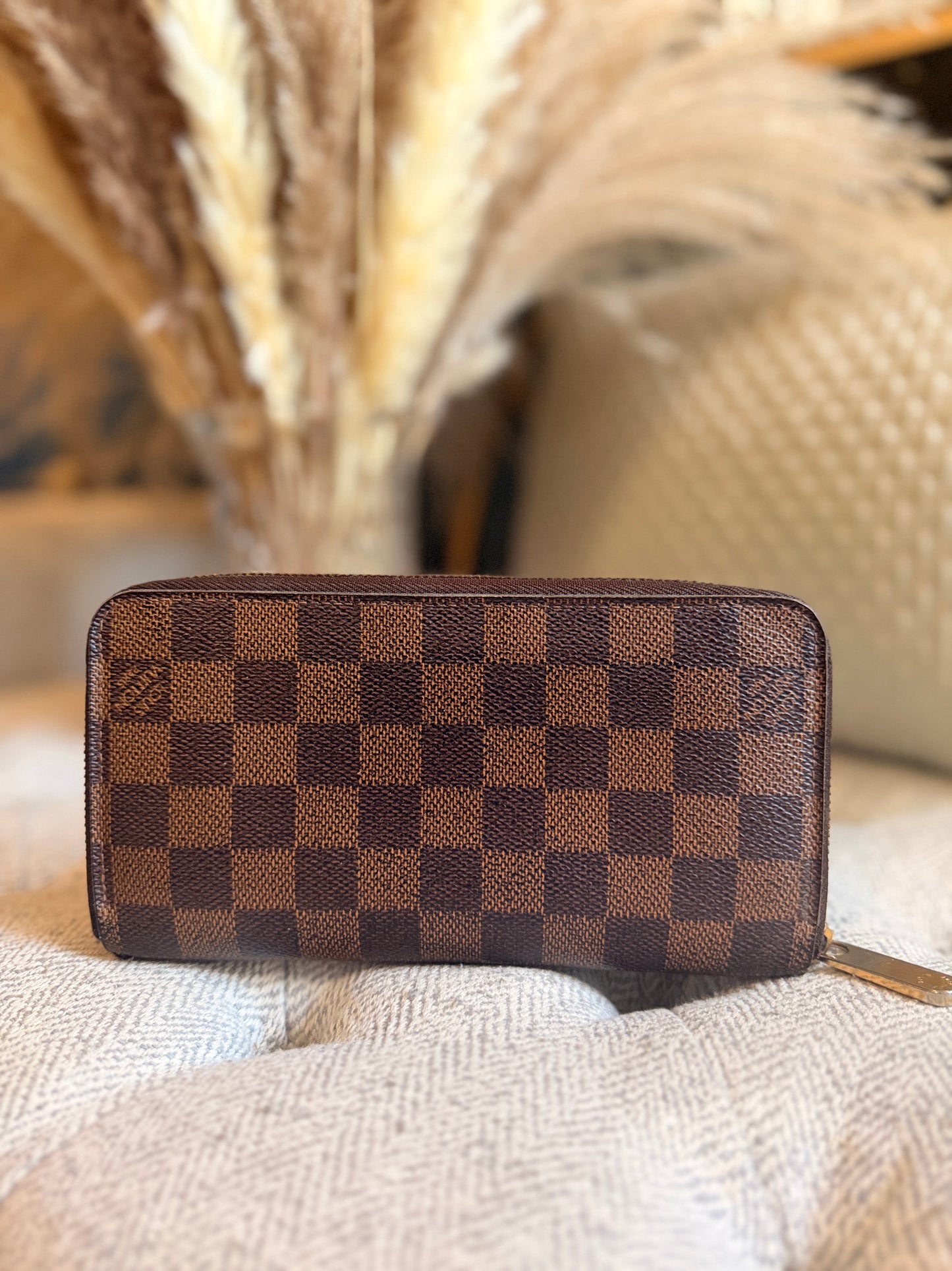 Louis Vuitton Zippy Wallet in Damier Ebene