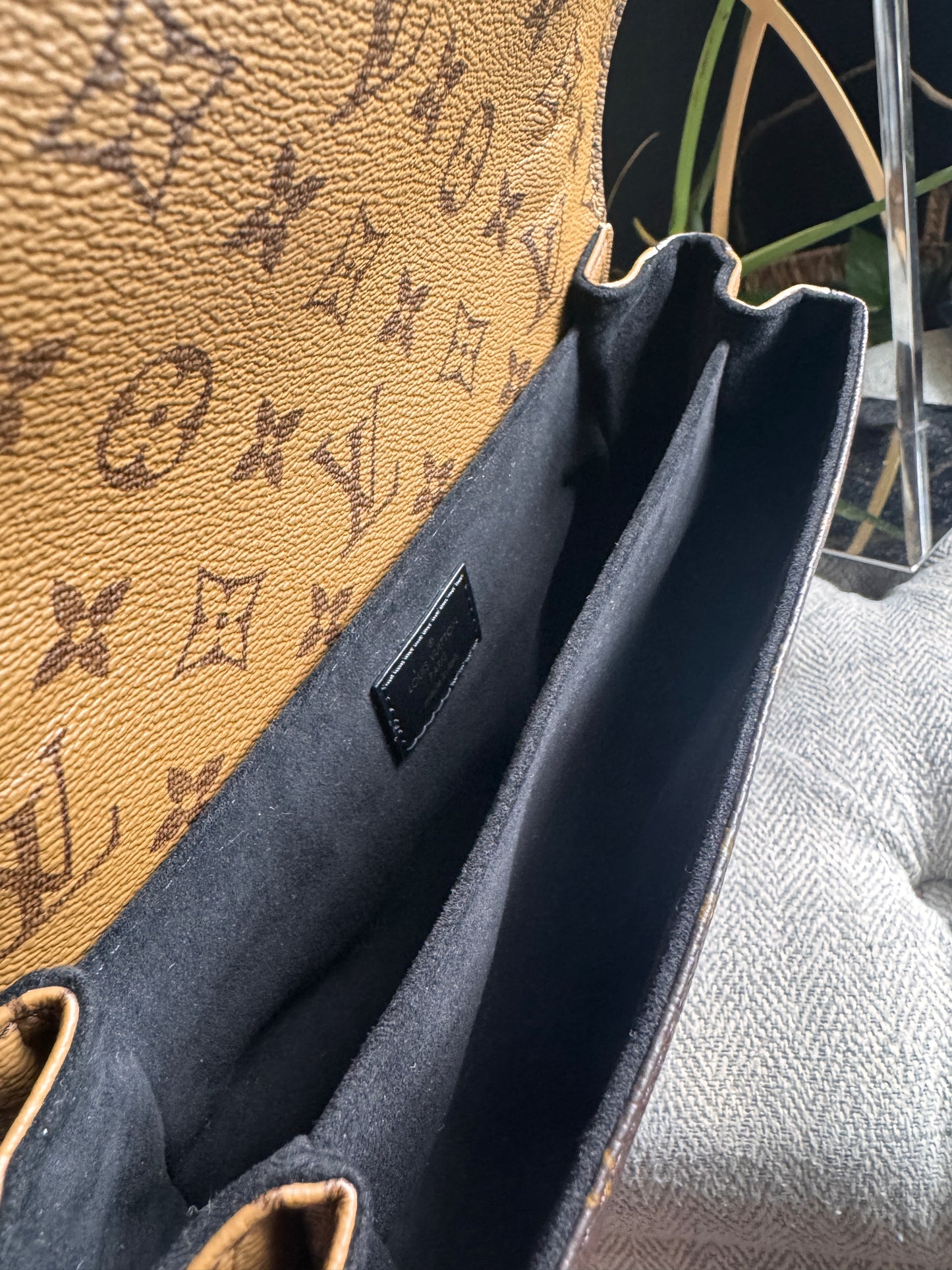 Louis Vuitton Pochette Metis in Reverse Monogram