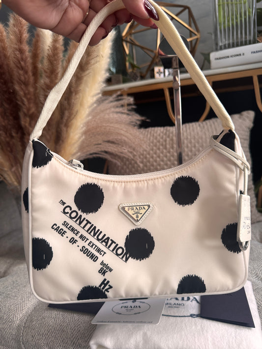 PRADA 
Tessuto Nylon Polka-Dot Mini Re-Edition 2000 Bag White Black