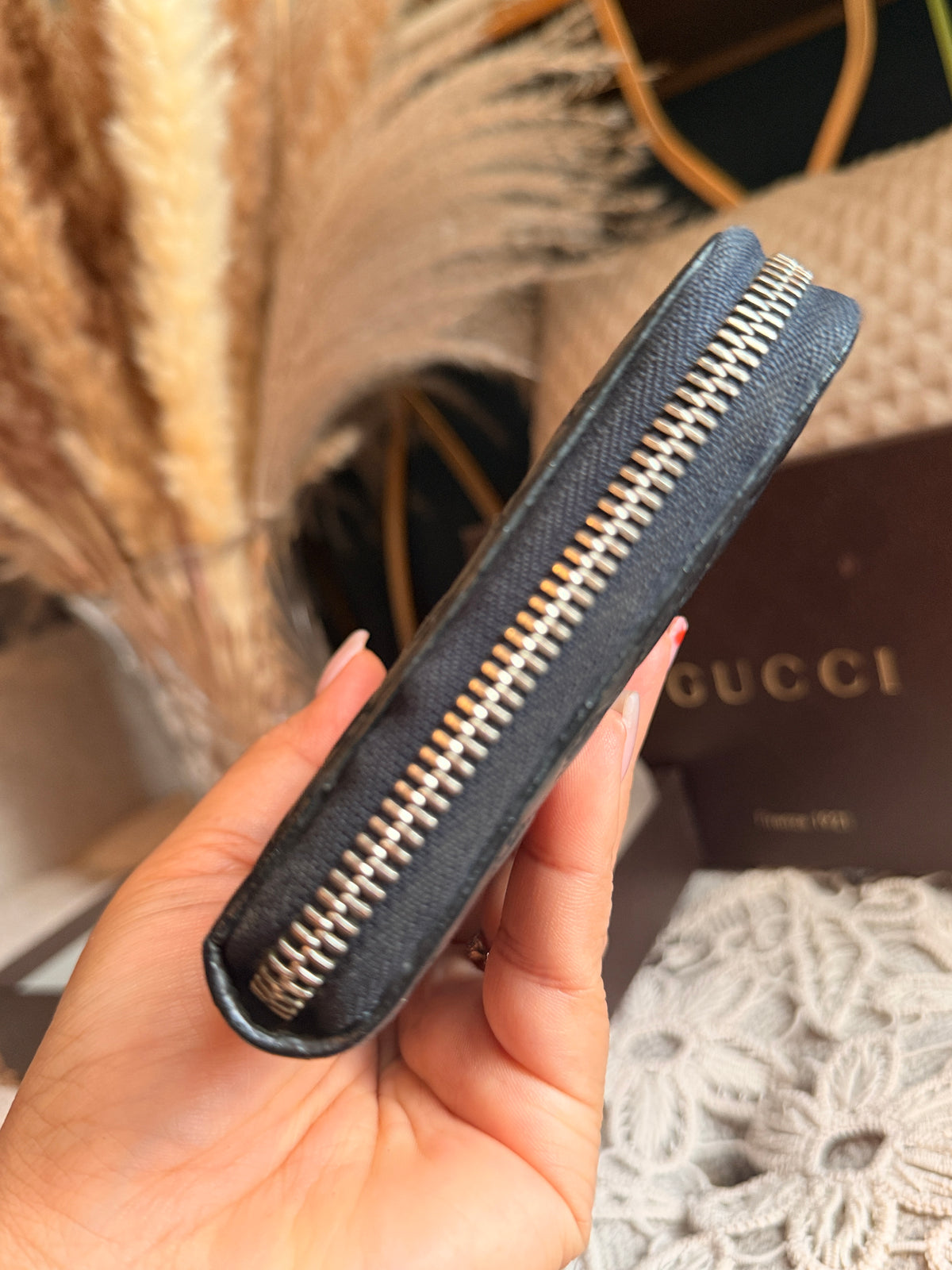 GUCCI
Blue Micro Guccissima Leather Long Zippy Organizer Wallet
