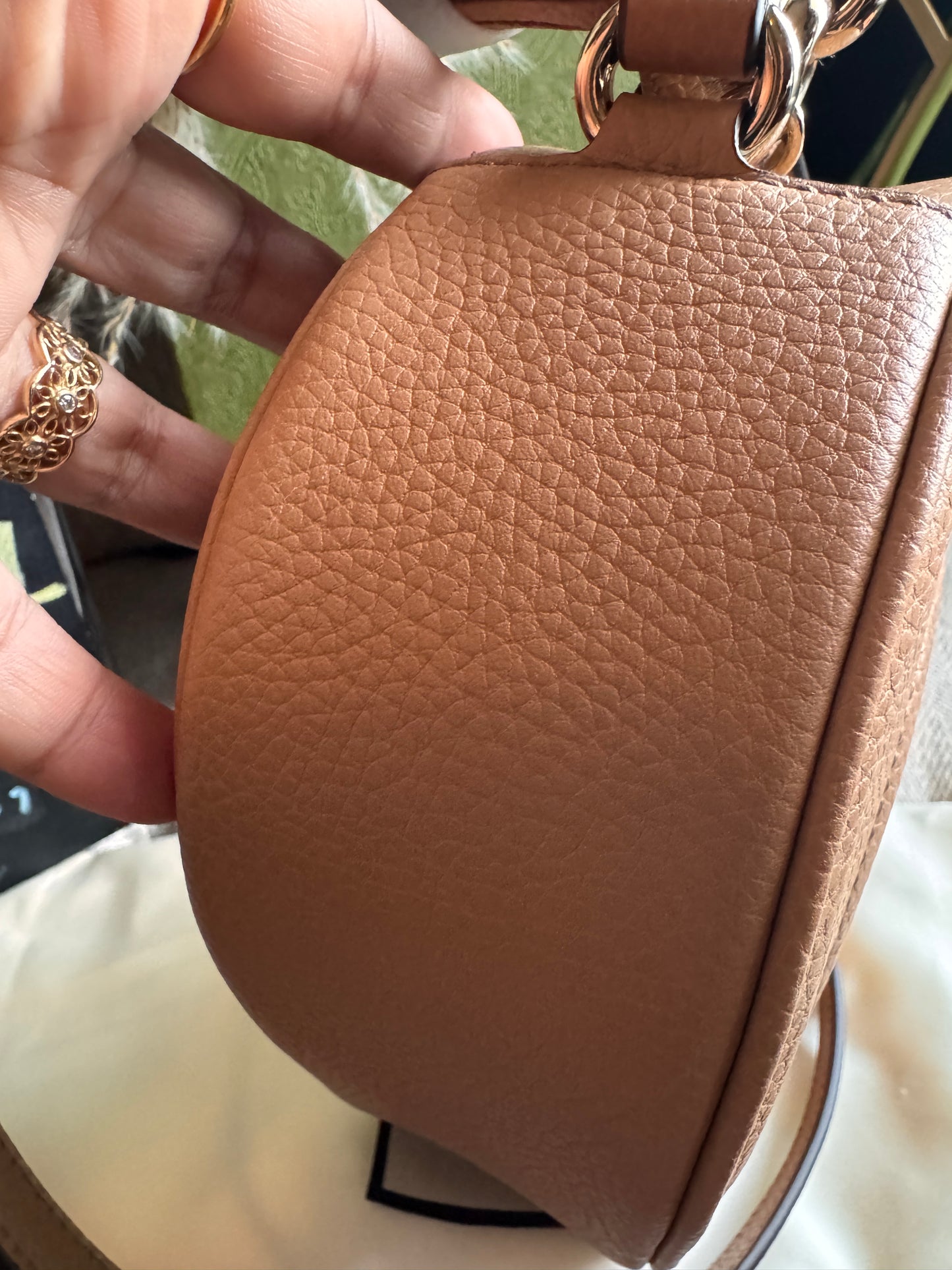 GUCCI 
Pebbled Calfskin Oval Soho Shoulder Bag Beige Camelia