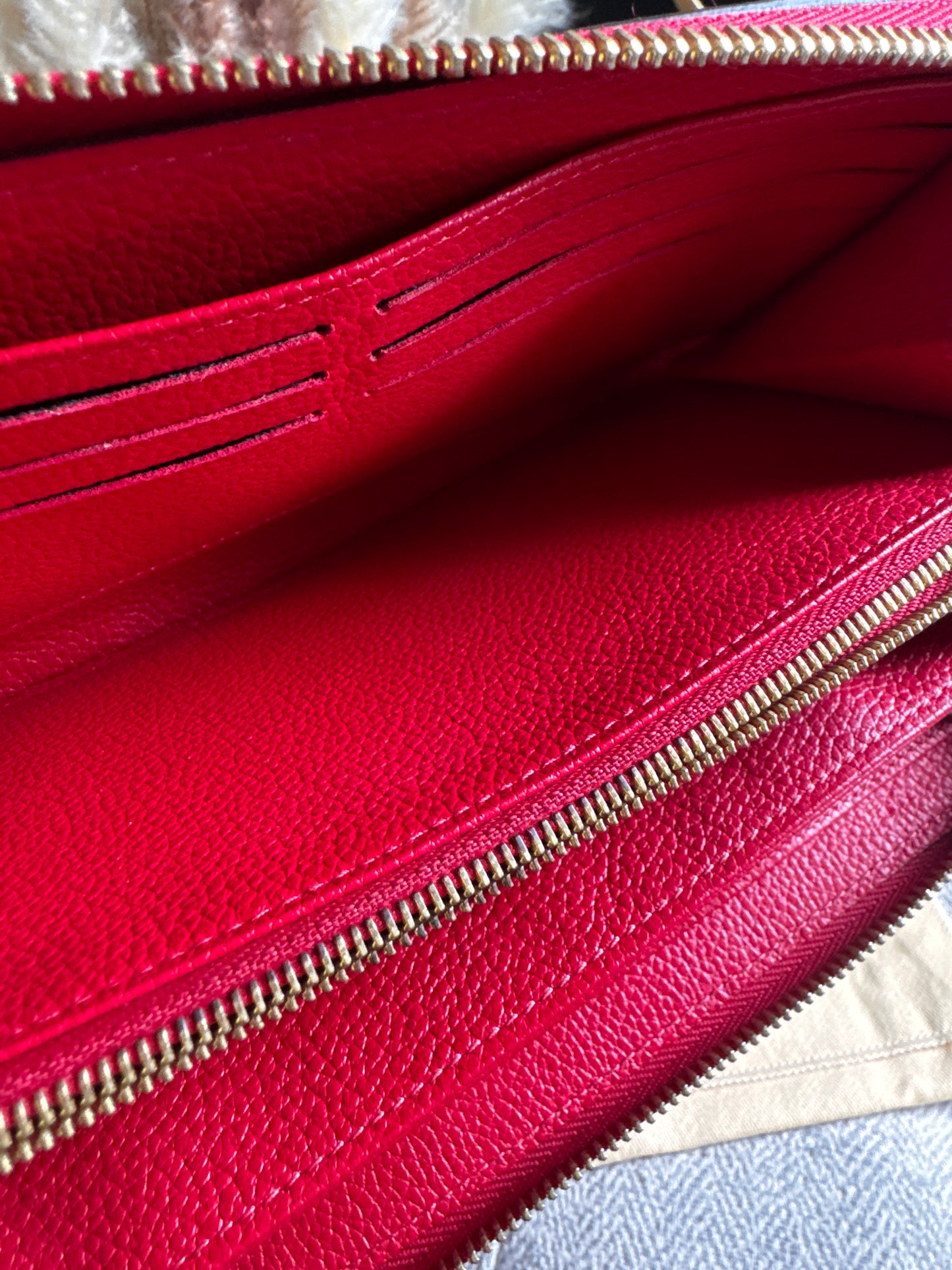 Louis Vuitton Empreinte Zippy Wallet