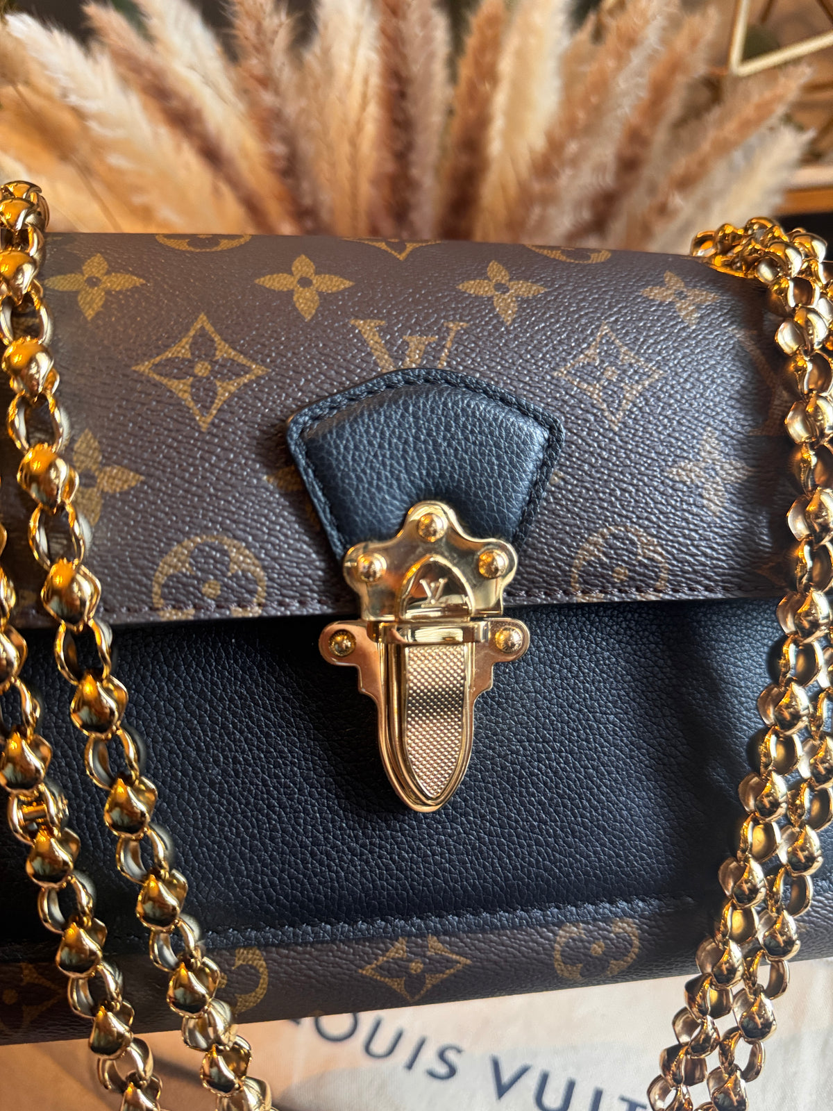 Louis Vuitton Victoire in Monogram and Black Calfskin