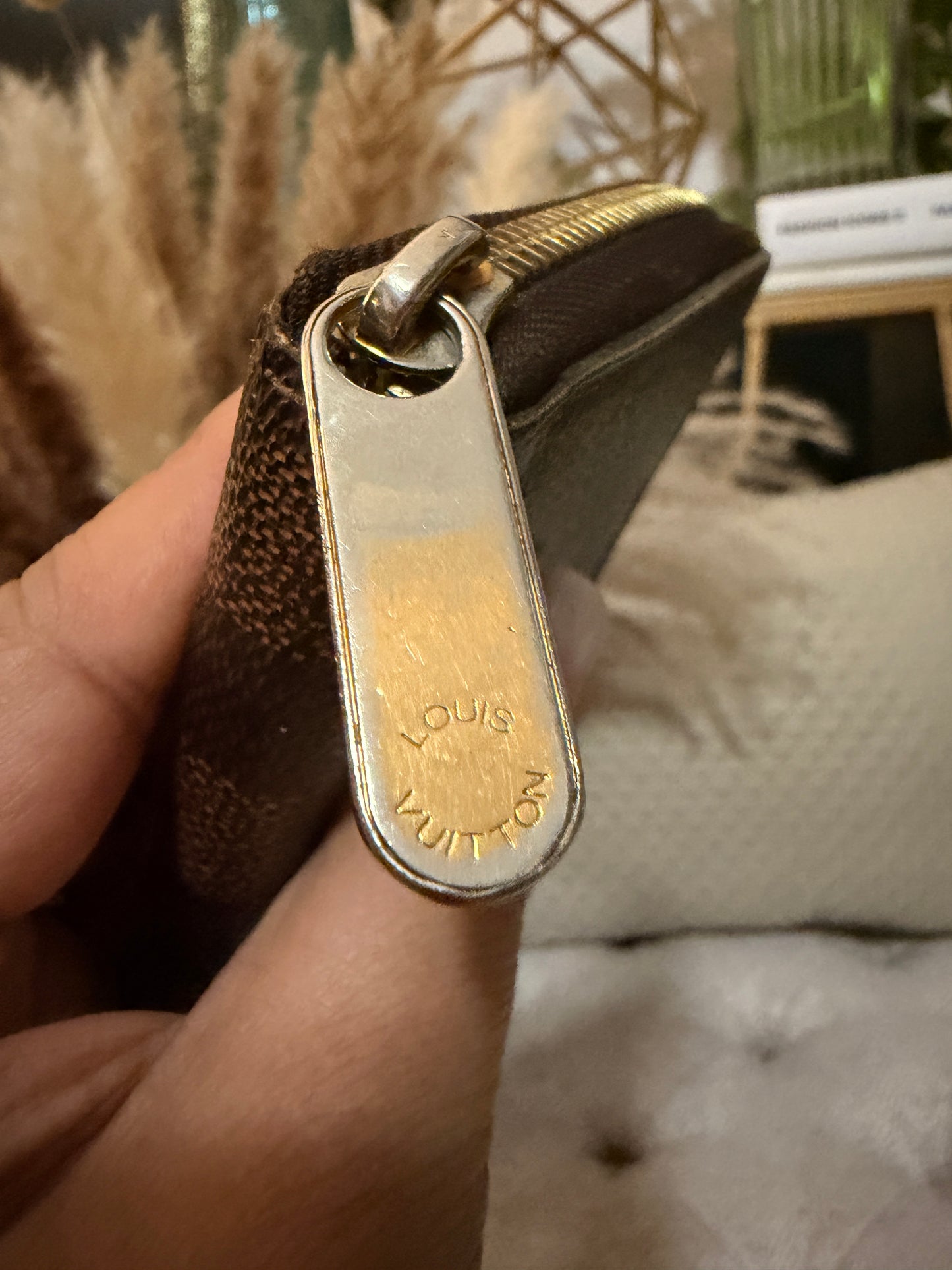 Louis Vuitton Zippy Wallet in Damier Ebene