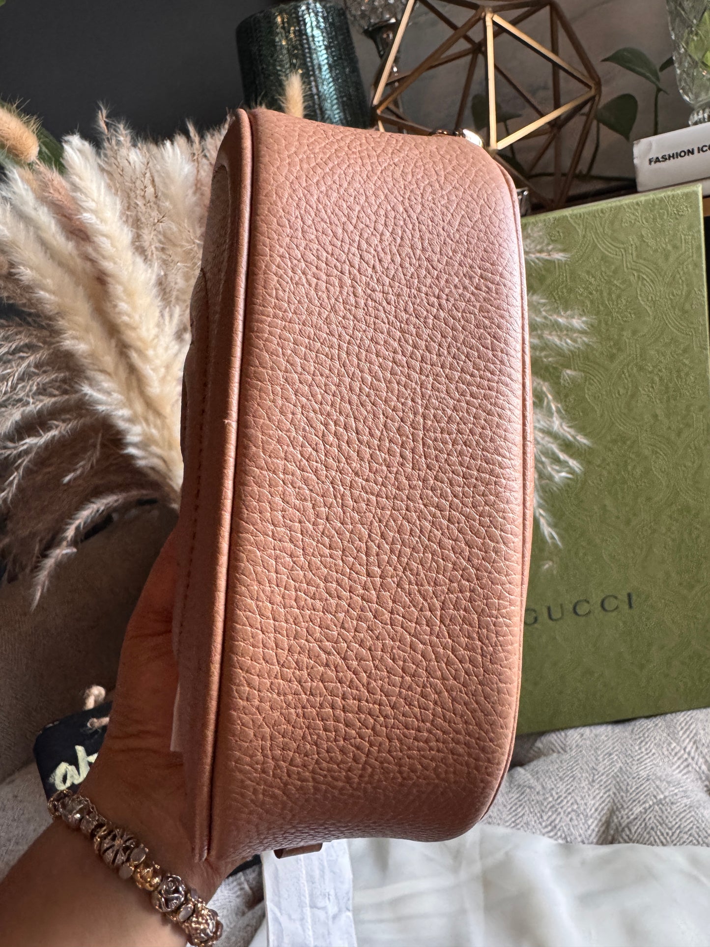 GUCCI 
Pebbled Calfskin Oval Soho Shoulder Bag Beige Camelia