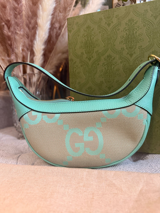 Gucci Jumbo GG Half-moon Mini Hobo