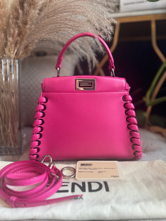 FENDI 
Nappa Lace Up Mini Peekaboo Iconic Satchel in Geranio