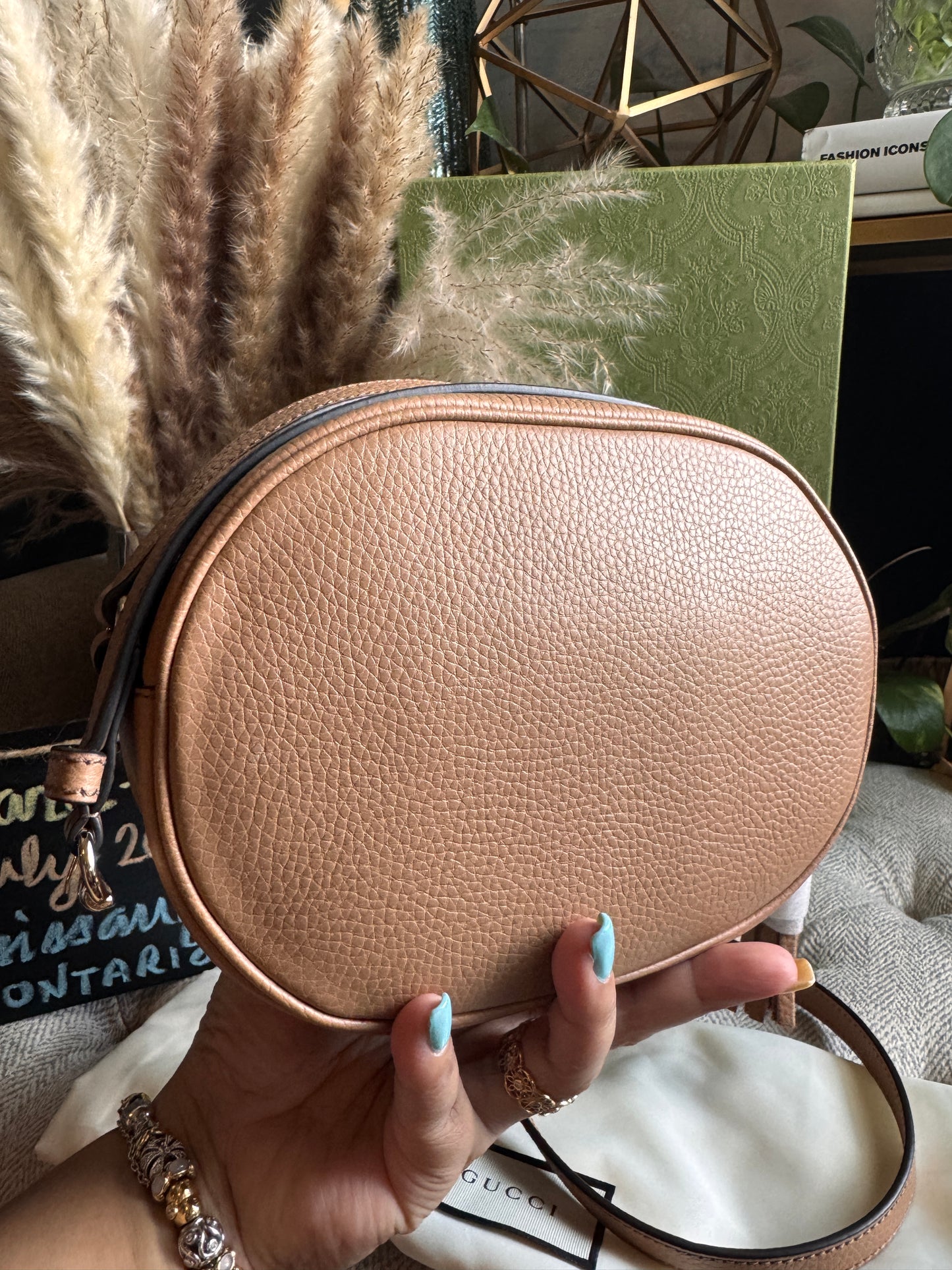 GUCCI 
Pebbled Calfskin Oval Soho Shoulder Bag Beige Camelia