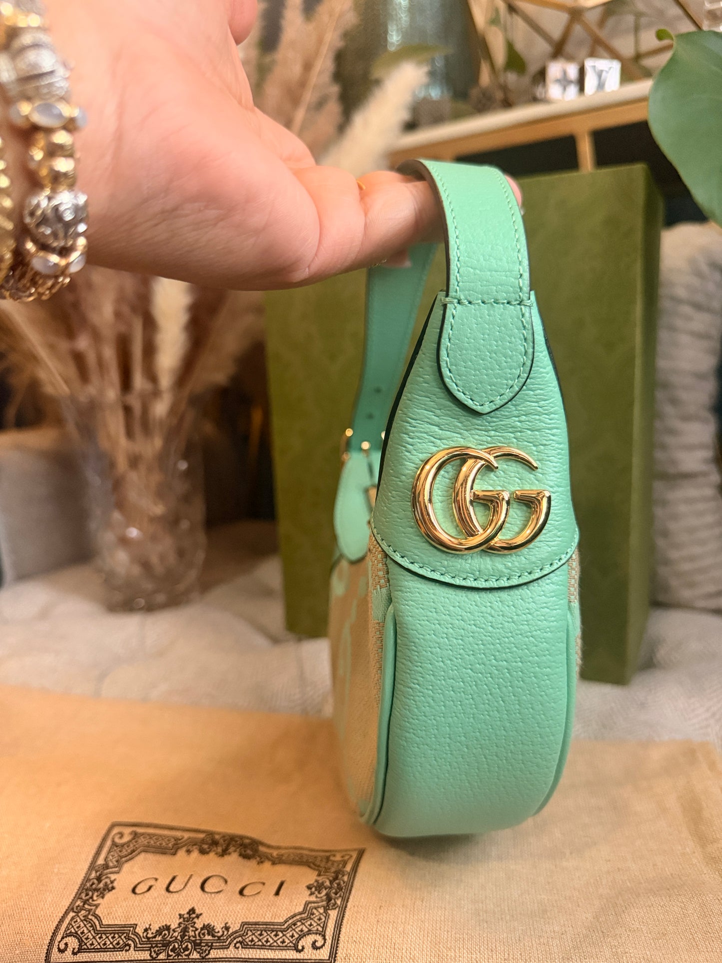 Gucci Jumbo GG Half-moon Mini Hobo